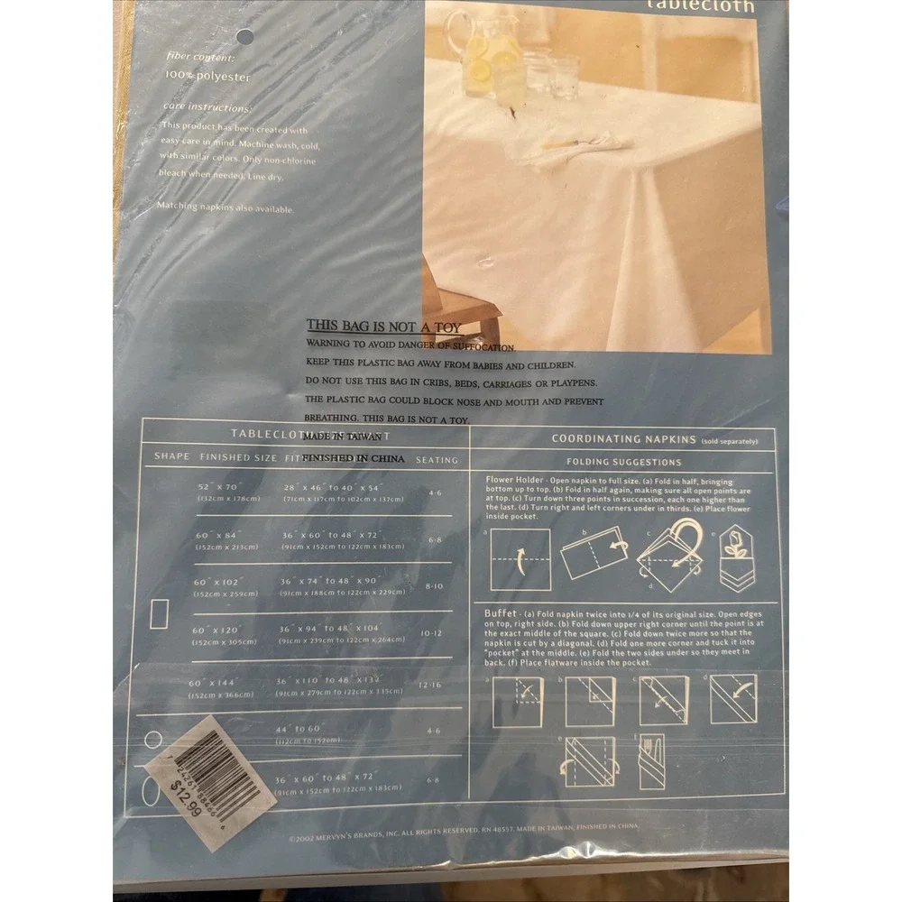Mervyns 2002 -70 inch‎ round tablecloth mustard plaid embossed polyester